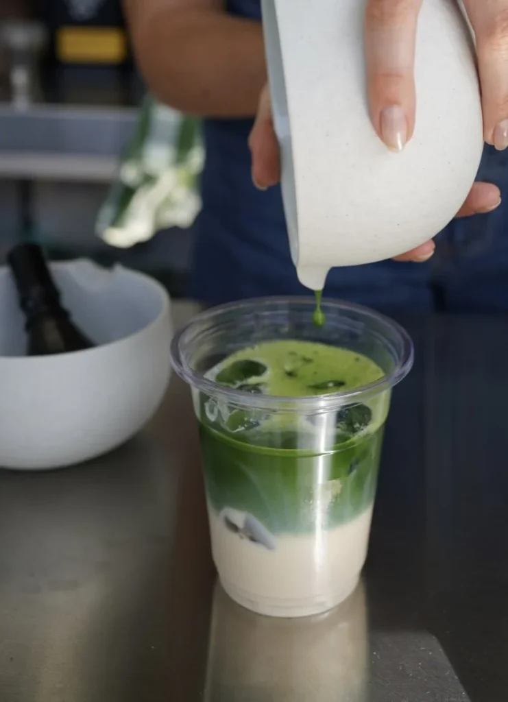 Barista Hire making Matcha at exhibition in Belgium