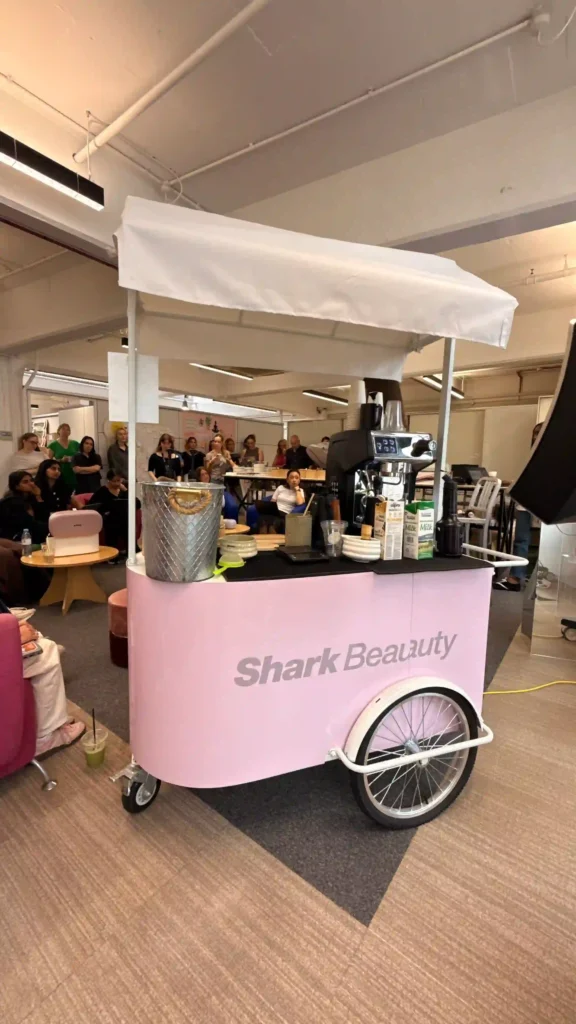 Strawberry matcha drink served at a branded beauty event